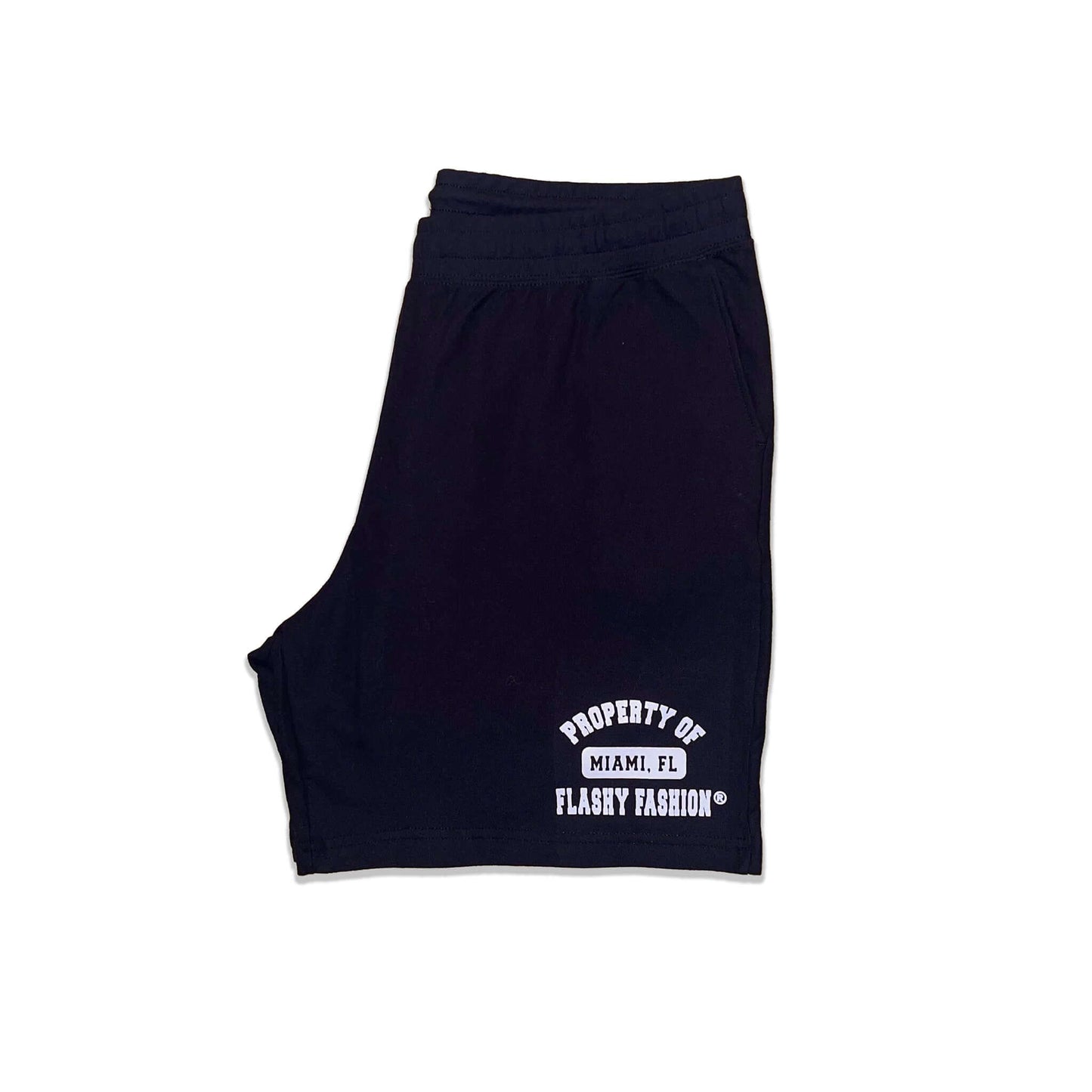 Shorts feature a white screenprinted design with "Stay Fresh, Stay Fly, Wear Flashy" on the right leg and the Property of Flashy Fashion design on lower left leg. Shorts are 6.5 oz 100% heavyweight ring spun cotton pique fabric. Covered elastic waistband