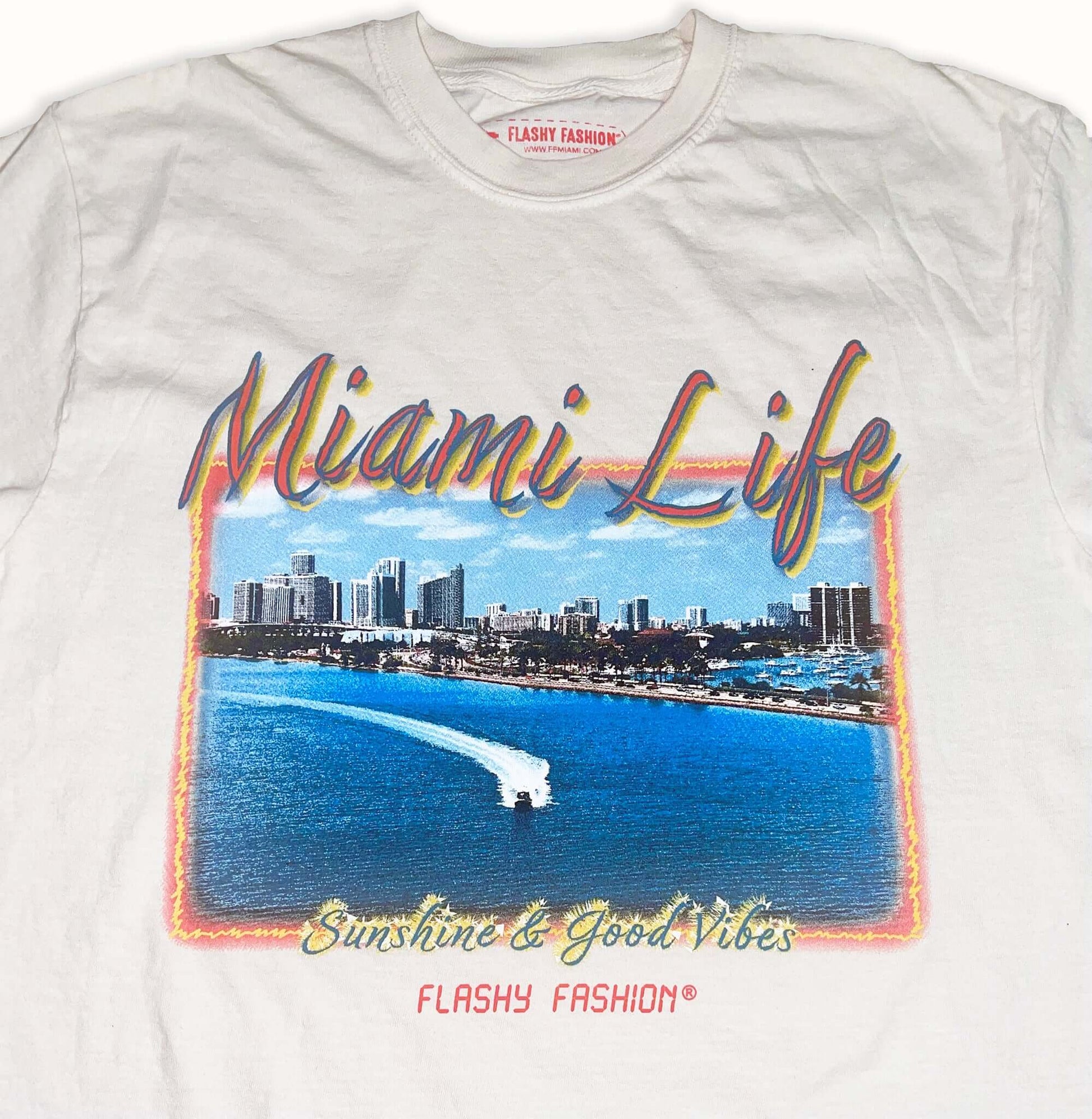 T-Shirt features a photo of a scene in Miami, FL redesigned as a painting with the Miami Life & Sunshine & Good Vibes. Screenprinted on an ivory garment-dyed heavyweight t-shirt. T-shirts are 6.1 oz. 100% soft ring-spun cotton with a relaxed fit.